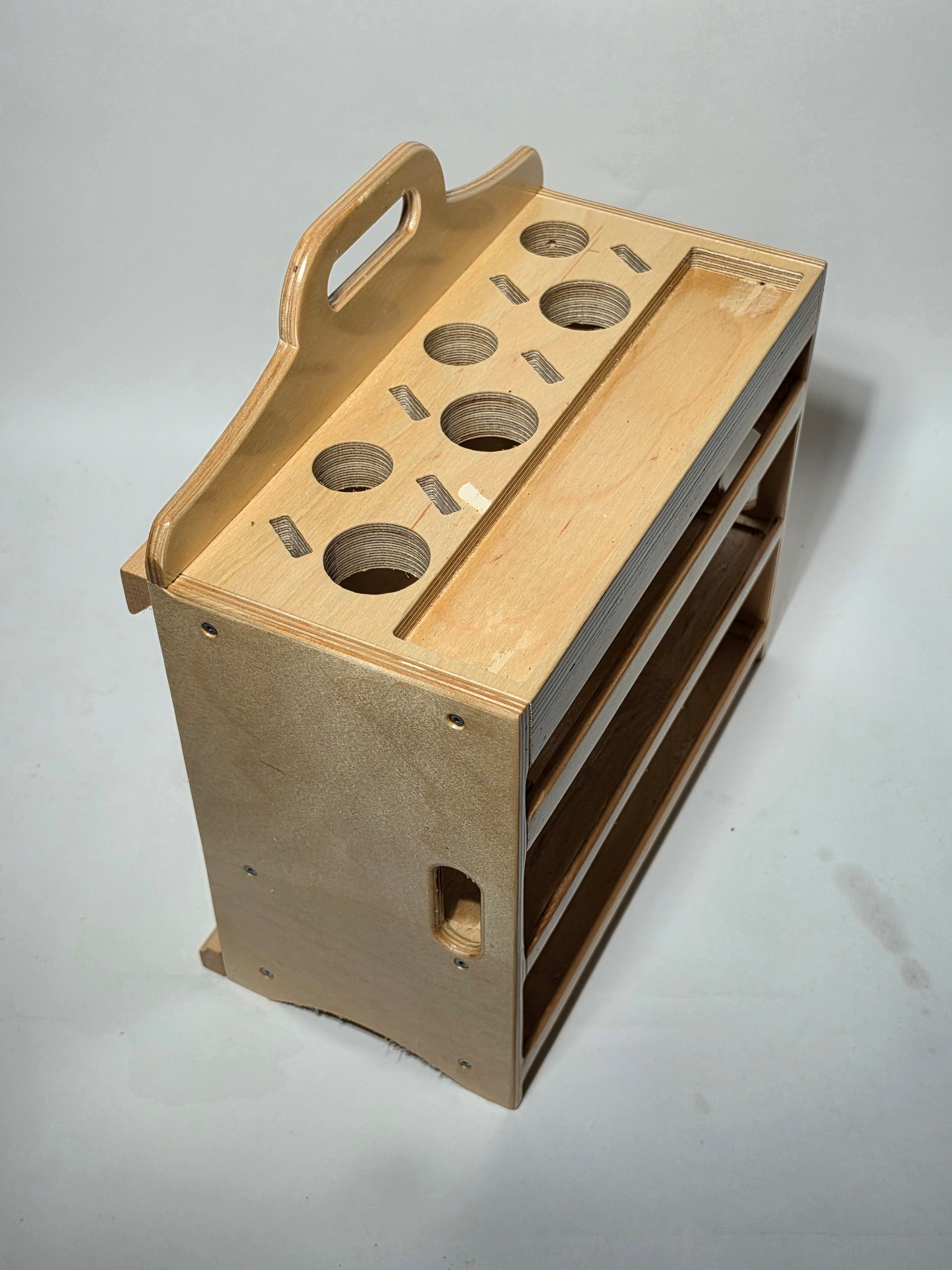 Top view of the Cocina™ Chef Caddy kitchen utensil organizer showing utensil storage openings, sharpening stone holder, and multi-purpose storage compartments.