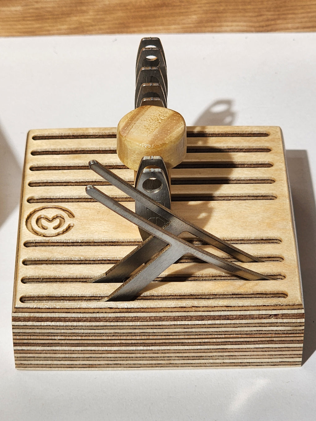 Removable luthier gauge tray shown with setup gauges and small guitar repair tools inside the El Banco™ bench organizer system.