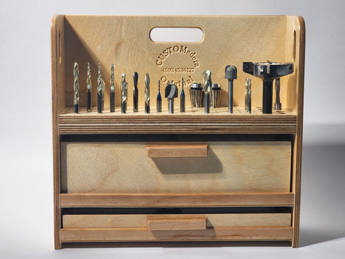 Front view of the El Centro™ Large CNC Bit Organizer, a handcrafted wooden caddy with precision-drilled bit storage for drill bits, router bits, countersinks, and cutters, plus two lower drawers, an integrated carry handle, CUSTOMadera branding, and a clean natural wood finish.