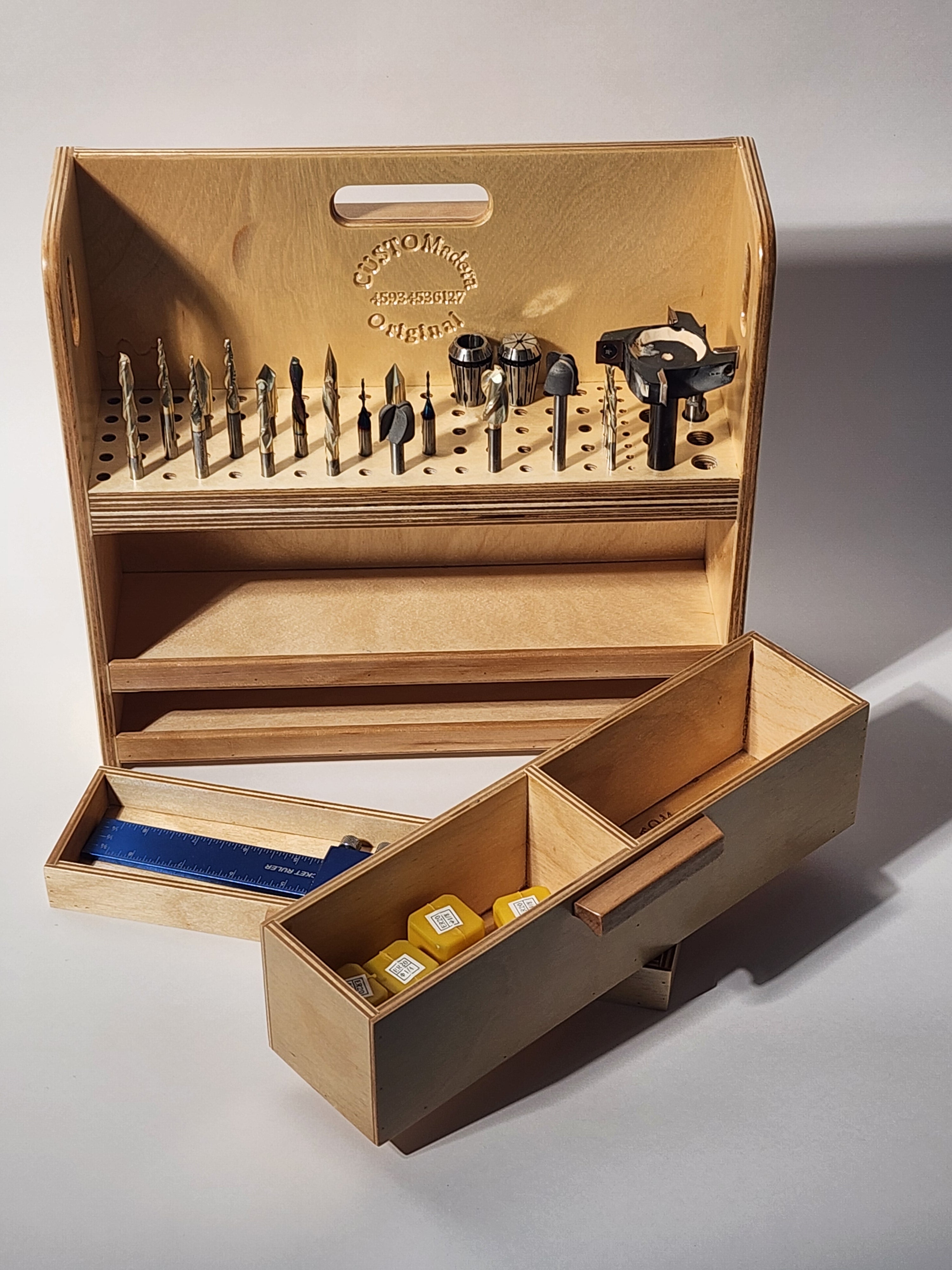 Large CNC Bit Organizer (El Centro™ Wooden Caddy) shown with drill bits, router bits, countersinks, and specialty cutters stored upright in the precision-drilled upper deck, with two smooth-sliding drawers open for layout tools, spare bits, accessories, and small shop essentials.